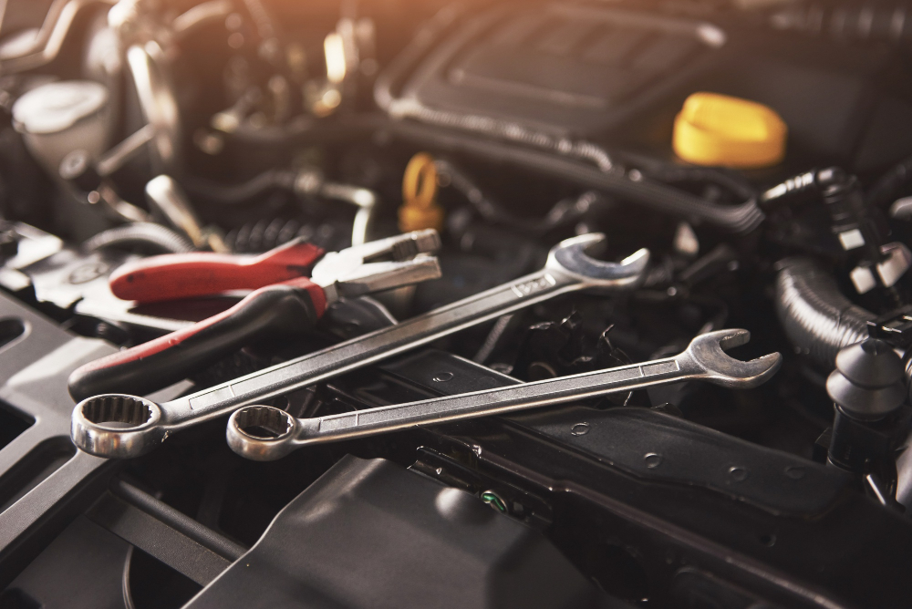 mechanic-hand-checking-fixing-broken-car-car-service-garage